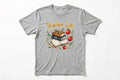 Teacher Life graphic tee with books, apples and a pencil