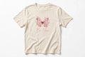 Cream women's graphic tee with a pink butterfly, floral details and Be You lettering