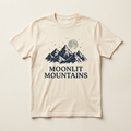 Cream T-shirt concept mockup with moonlit mountain peaks, stars and Moonlit Mountains lettering