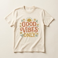 Cream T-shirt concept mockup with Good Vibes Only lettering, smiling sun and daisies